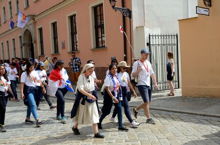 WROCLAW, POLAND - JULY 23: Unidentified group of pilgrims join Days In Dioceses to prepare just before The World Youth Day in Cracow. Pilgrims walk from Cathedral on July 23rd 2016 in Wroclaw.のeditorial素材