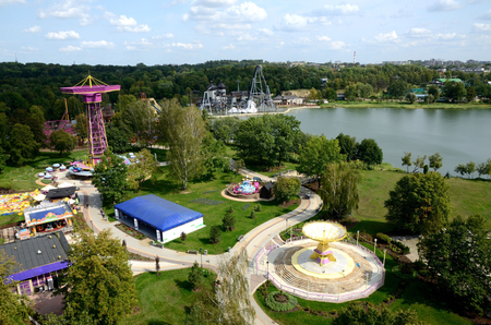 Amusement park in Chorzow, Upper Silesia, Poland. General landscape of park with lake and carouselsのeditorial素材