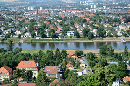 View from the hill: Dresden city, Saxony state in Germany. Houses, residential buildings and Elbe river.の写真素材