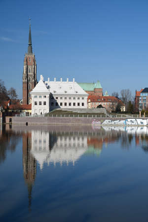 WROCLAW, POLAND - 21st February 2021: Wroclaw cityscape, Old Town, st. John's cathedral with Odra river.のeditorial素材