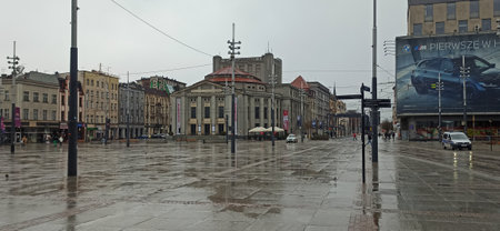 Poland, Katowice - February 26: Katowice city center. City Market in rainy day with classic buildings.のeditorial素材