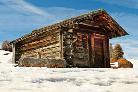 Mountain shed in winter scenery.の写真素材