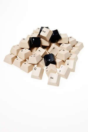 A heap of computer keyboard buttons over white background.