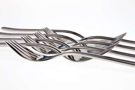 Fork parallel pattern over a white background.の写真素材