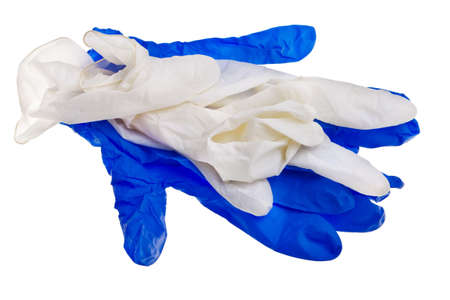 Blue and white latex gloves isolated over white background.の写真素材