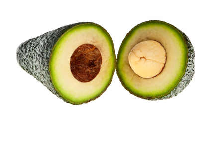Avocado fruit cross section isolated over white background.