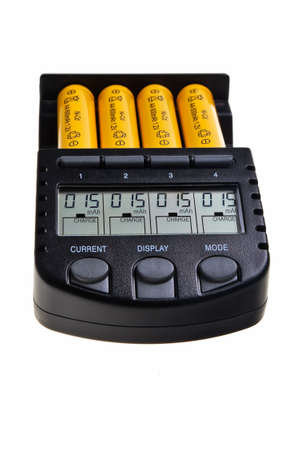 Accu charger in operation isolated over white background.の写真素材
