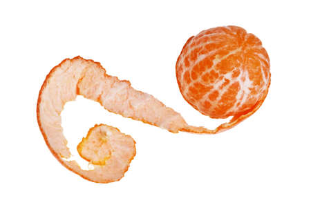 Mandarin with its skin away isolated over white background.の写真素材