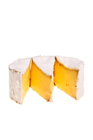 Camembert soft cheese cut into three parts over white background.の写真素材