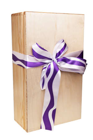 Wooden gift box wrapped in ribbon isolated over white backgrond.の写真素材