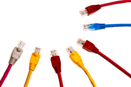 Colorful twisted pair patchcords isolated over white background.