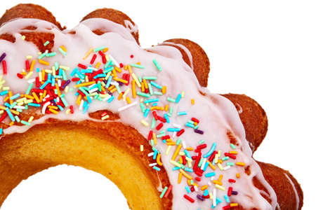 Delicious Easter cake topped with sweet glaze over white background.