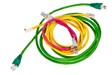 Green, yellow and pink patch cords with RJ45 plugs isolated over white background.