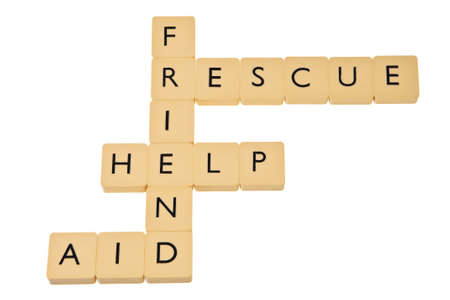 Words help, rescue, friend and aid as crossword isolated over white background.の写真素材