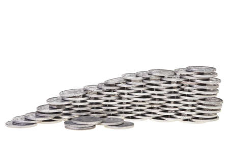 Silver coins stacked over white background.