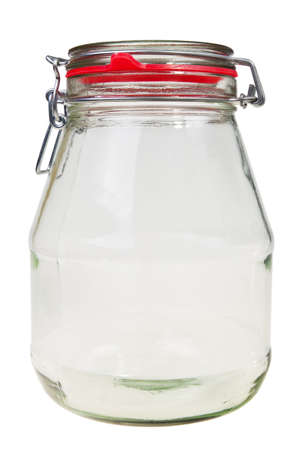 Empty, transparent glass jar with vacuum closing lid isolated over white background.の写真素材