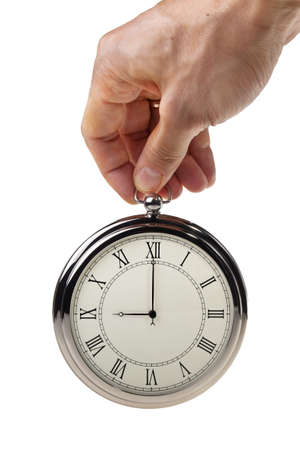 Nine o'oclock on retro watch isolated over white background.の写真素材