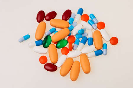 Colorful pills isolated over white background.の写真素材