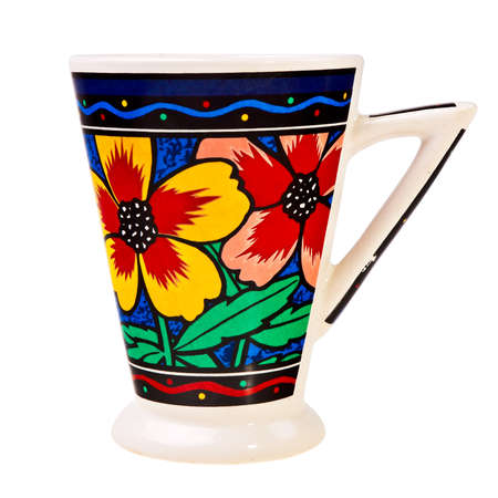 Colorful ceramic teapot with flowers isolated over white background.の写真素材