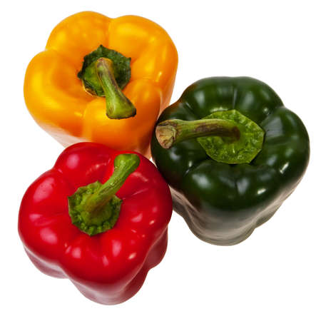 Three peppers red, green and yellow top view, isolated over white background.の写真素材