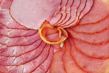Sliced ham and tenderloin pattern closeup view の写真素材