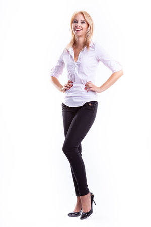 Figure young adult attractive blonde student woman posing on white backgroundの写真素材
