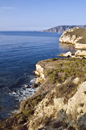 Cliffs near Avila Beach drop sharply into the surf の写真素材