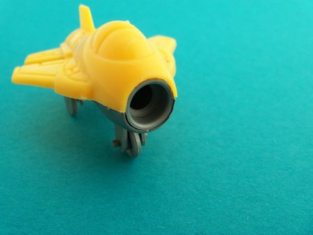 A small yellow toy jet