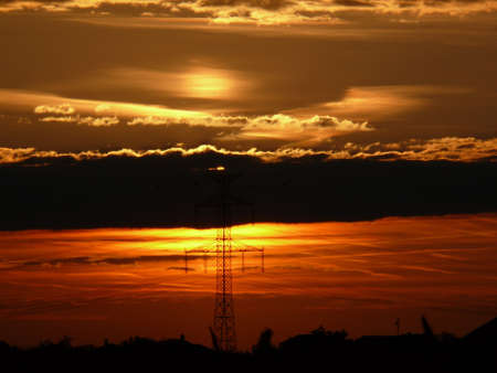 Electric line at sunsetの写真素材