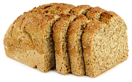 a loaf of bread with three slices on a white tableの写真素材