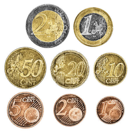 A set of well worn Euro coins on a white backgroundの写真素材