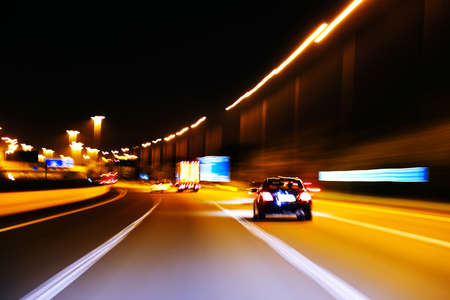 An impression style of picture of moving traffic on a motor way at night