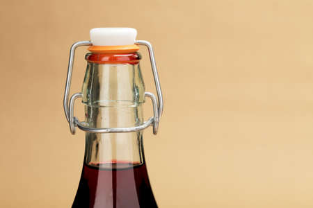 A close-up picture of a home made red wine in a classic bottleの写真素材