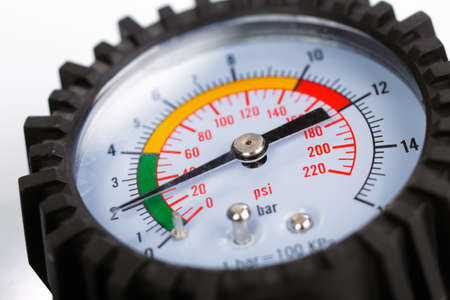 A compressor pressure gauge on a white backgroundの写真素材