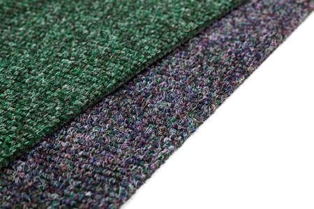 A close up picture of a gray and green carpetの写真素材