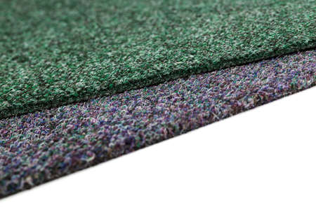 A close up picture of a gray and green carpetの写真素材