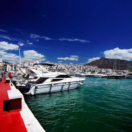 Luxury yachts and motor boats moored in Puerto Banus marina in Marbella, Spain  のeditorial素材