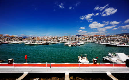 Luxury yachts and motor boats moored in Puerto Banus marina in Marbella, Spain  のeditorial素材