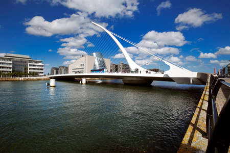 Samuel Beckett Bridge by architect Santiago Calatrava and both banks of the river Liffey in Dublin...