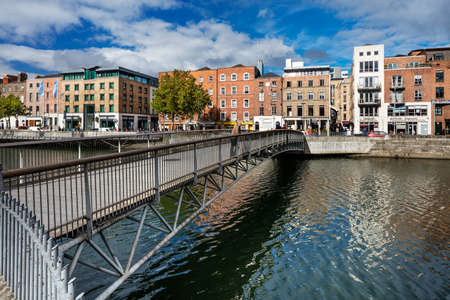 Millennium Bridge is a pedestrian bridge over the river Liffey in Dublin City Centreのeditorial素材