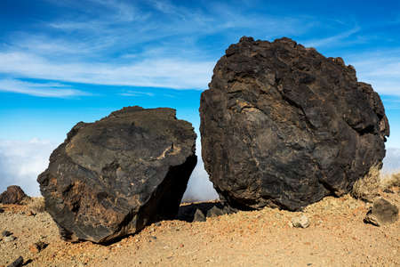 Teide National Park, Tenerife, Canary Islands - A view of 'Teide Eggs', or in Spanish 'Huevos del Teide'. These accretion balls form as pieces solidified lava roll over a still molten surface.の写真素材