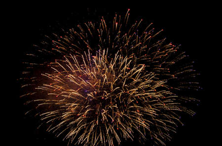 Fireworks display at nightの写真素材