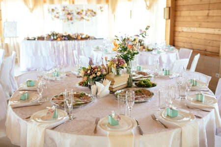 Wedding table appointments with beautiful decor and flowers Valentines Day backgroundの写真素材