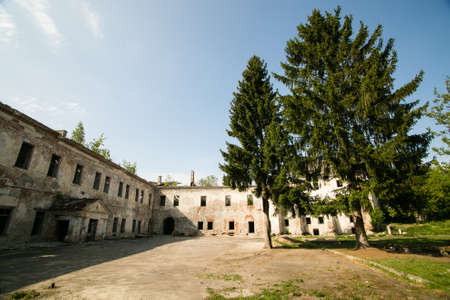 Ruins of the old Klevan castle. Ruined wall with windows against the blue sky. Courtyard. Rivne...
