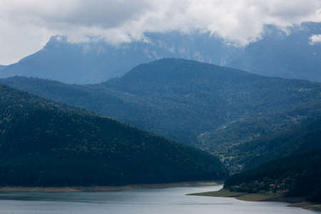 Cloudy landscape view from Lake Bicaz in Romaniaの写真素材