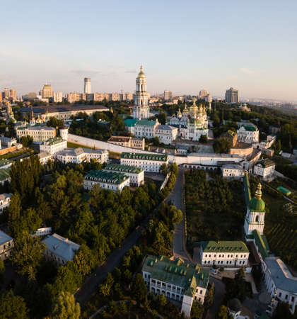 Aerial top view of Kiev Pechersk Lavra churches on hills from above, cityscape of Kyiv city at sunrise, Ukraineの写真素材