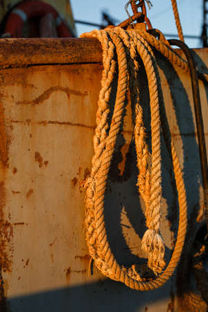 Old ropes rust on old ship. Rope slingの写真素材