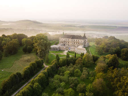 Aerial top view to famous ukranian sightseeing - Old palace castle in Pidhirci was build by Stanislav Koniecpolski, Lviv region, Ukraineのeditorial素材