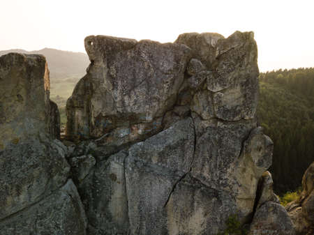 Aerial view to Tustan fortress - archeological and natural monument of national significance in Urych at golden evening hour, Urych, Ukraineの写真素材