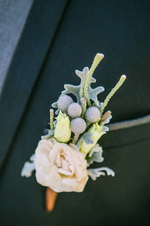 Boutonniere on the lapel of the groom